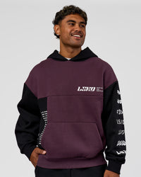 Man wearing Deconstructed Fleece Hoodie - Caviar-Midnight Plum | Model:Xav | Size:L