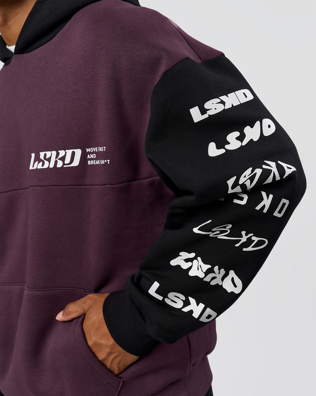 Man wearing Deconstructed Fleece Hoodie - Caviar-Midnight Plum | Model:Xav | Size:L