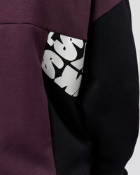 Man wearing Deconstructed Fleece Hoodie - Caviar-Midnight Plum | Model:Xav | Size:L