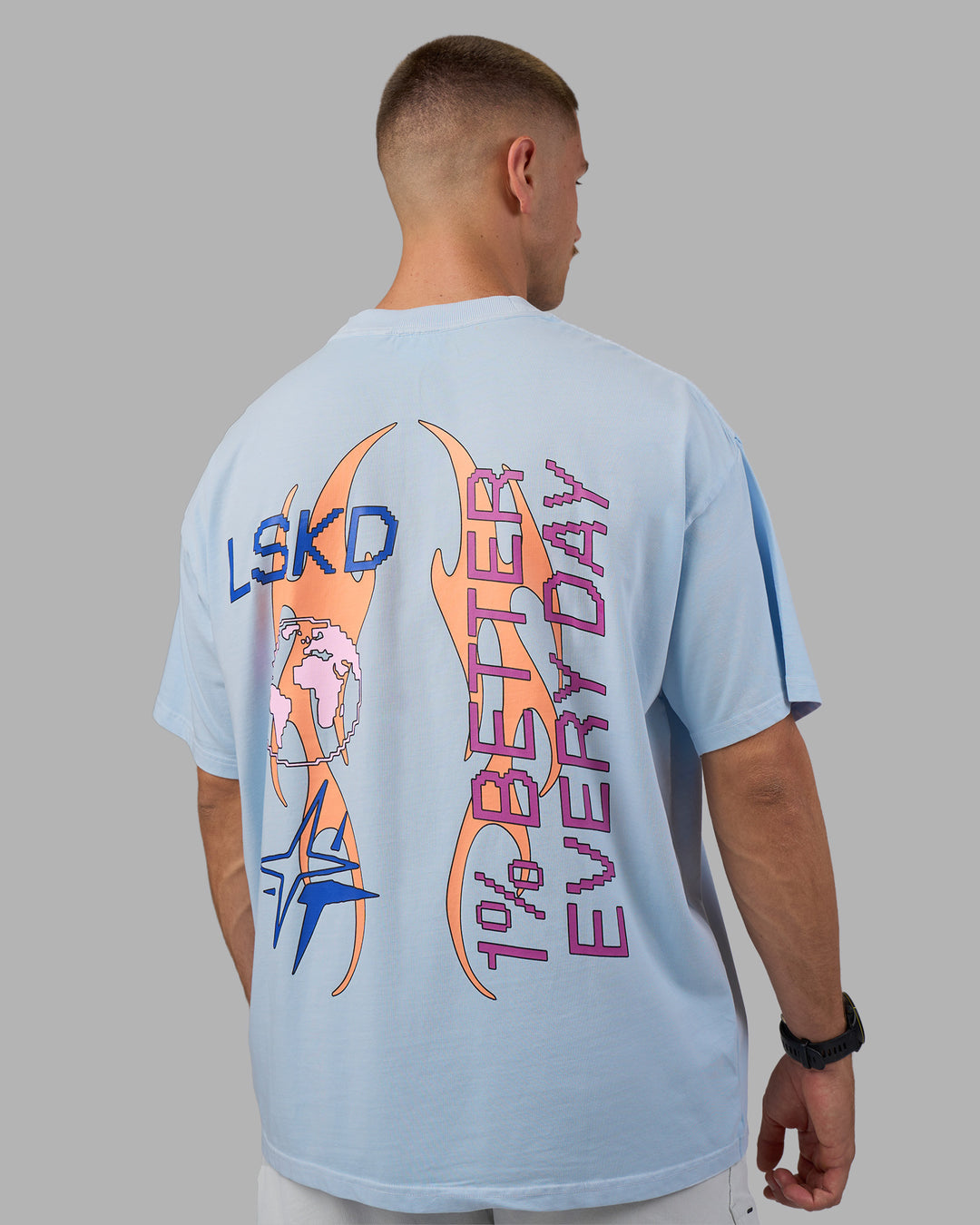 Man wearing Digital World Heavyweight Oversized Tee - Open Air-Cantaloupe | Model:Nikola | Size:L