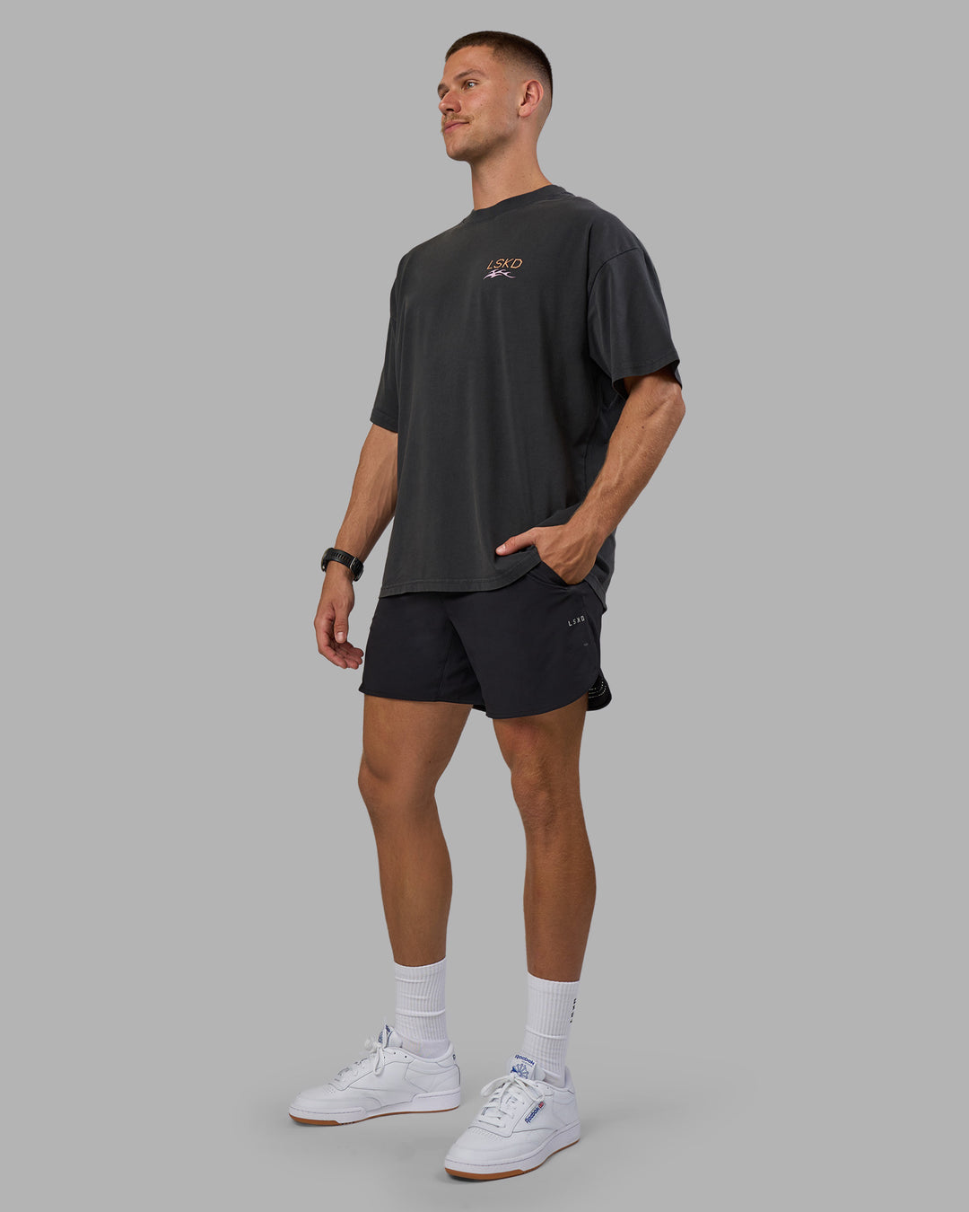 Man wearing Digital World Heavyweight Oversized Tee - Washed Black | Model:Nikola | Size:L