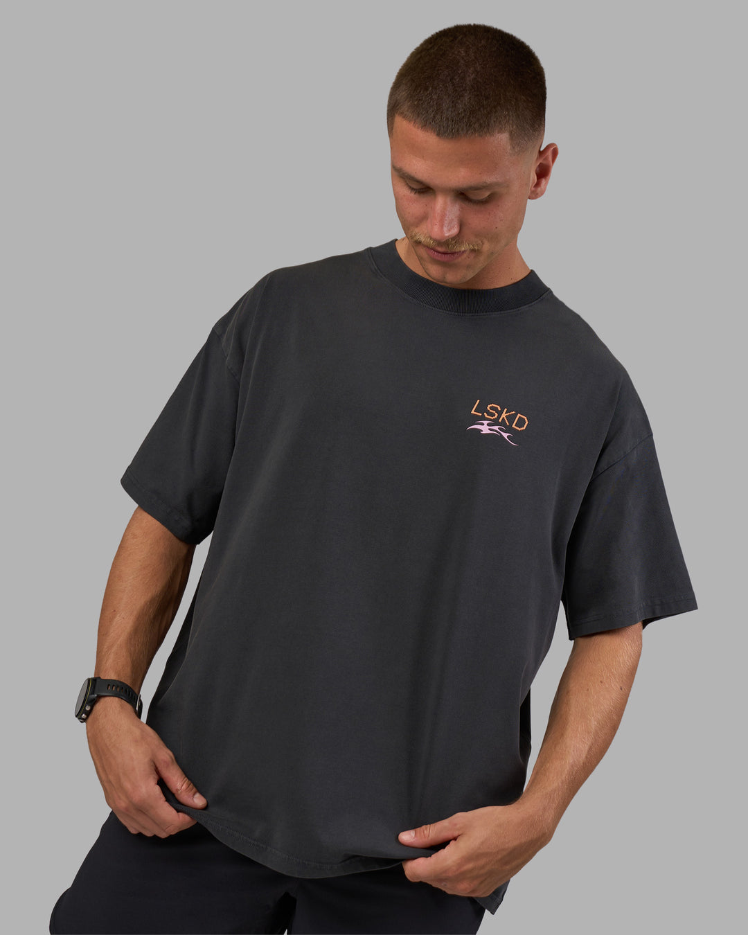 Man wearing Digital World Heavyweight Oversized Tee - Washed Black | Model:Nikola | Size:L