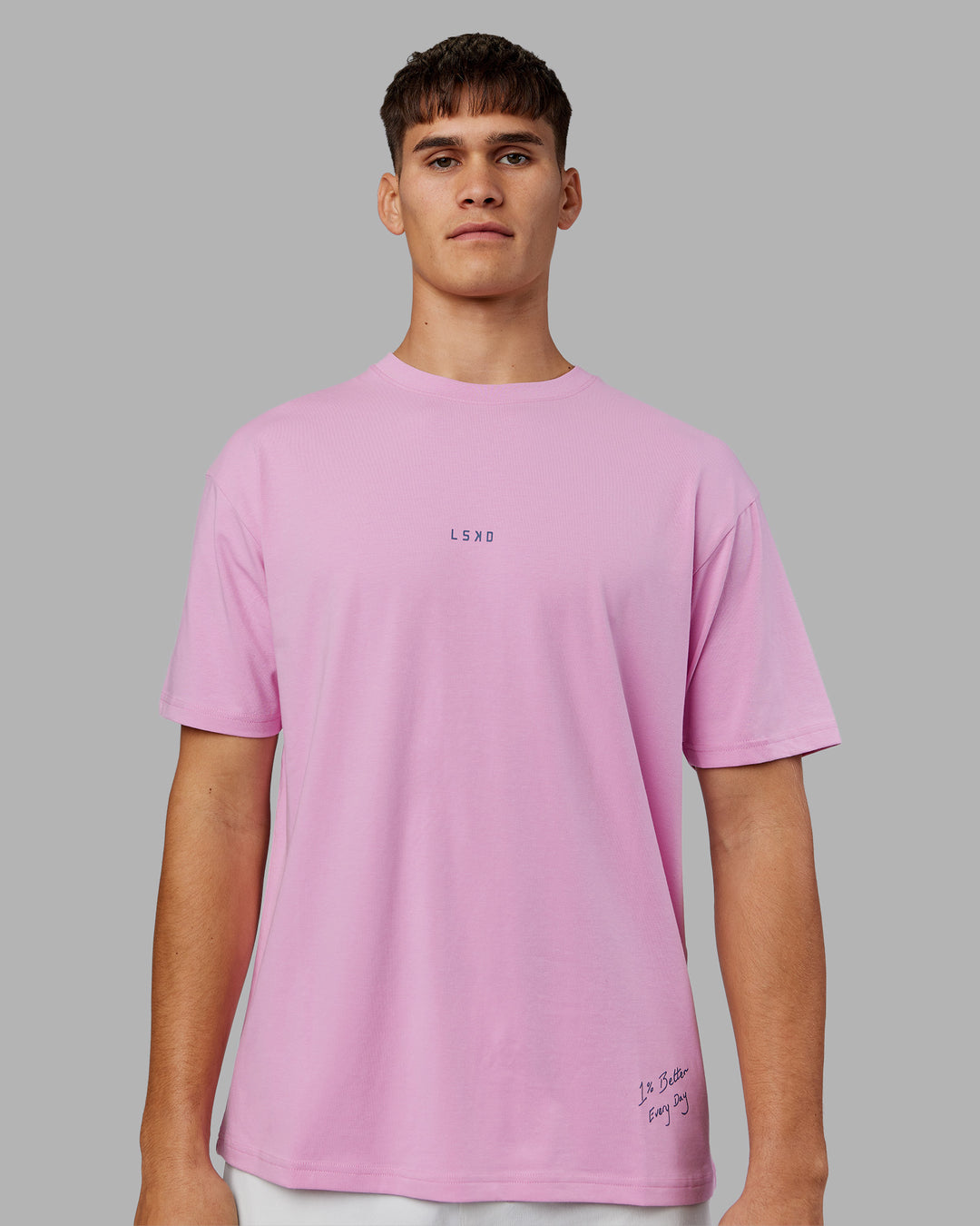 Man wearing ETJ Values FLXCotton Oversize Tee - Bubblegum-Indigo | Model:Jackson | Size:L