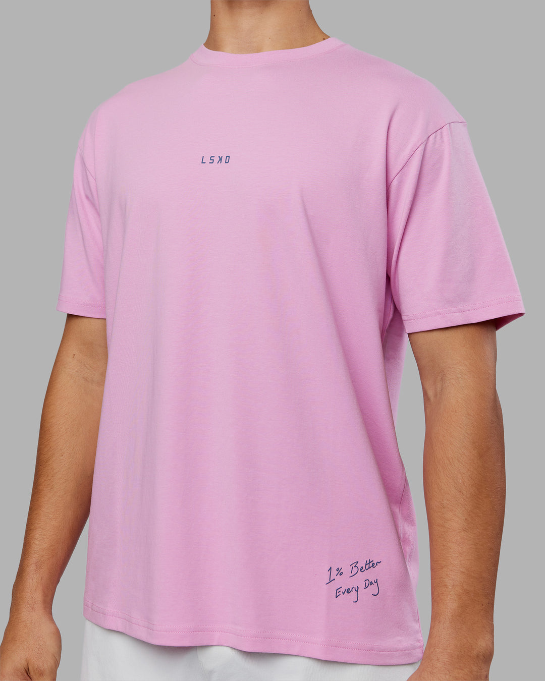 Man wearing ETJ Values FLXCotton Oversize Tee - Bubblegum-Indigo | Model:Jackson | Size:L
