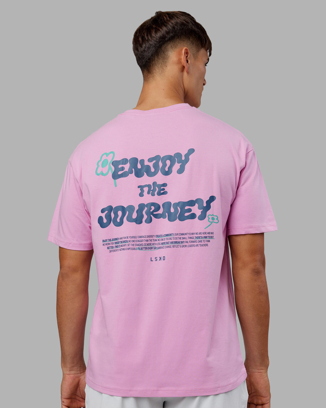 Man wearing ETJ Values FLXCotton Oversize Tee - Bubblegum-Indigo | Model:Jackson | Size:L