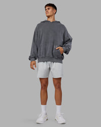 Man wearing ETJ Values Washed Unisex Oversize Hoodie - Dark Storm-Light Bubblegum | Model:Jackson | Size:L