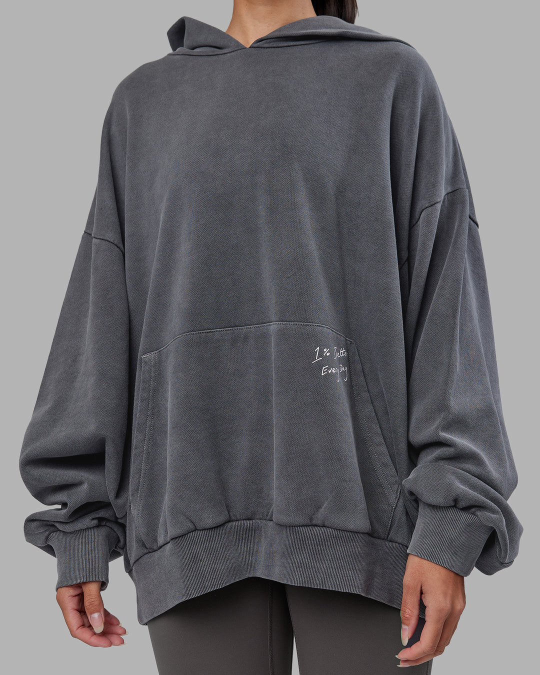 Woman wearing ETJ Values Washed Unisex Oversize Hoodie - Dark Storm-Light Bubblegum | Model:Rhiley | Size:L