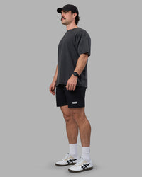 Man wearing Easy FLXCotton Tee Oversize - Black Washed | Model:Adam | Size:L | Thumbnail Index: 5