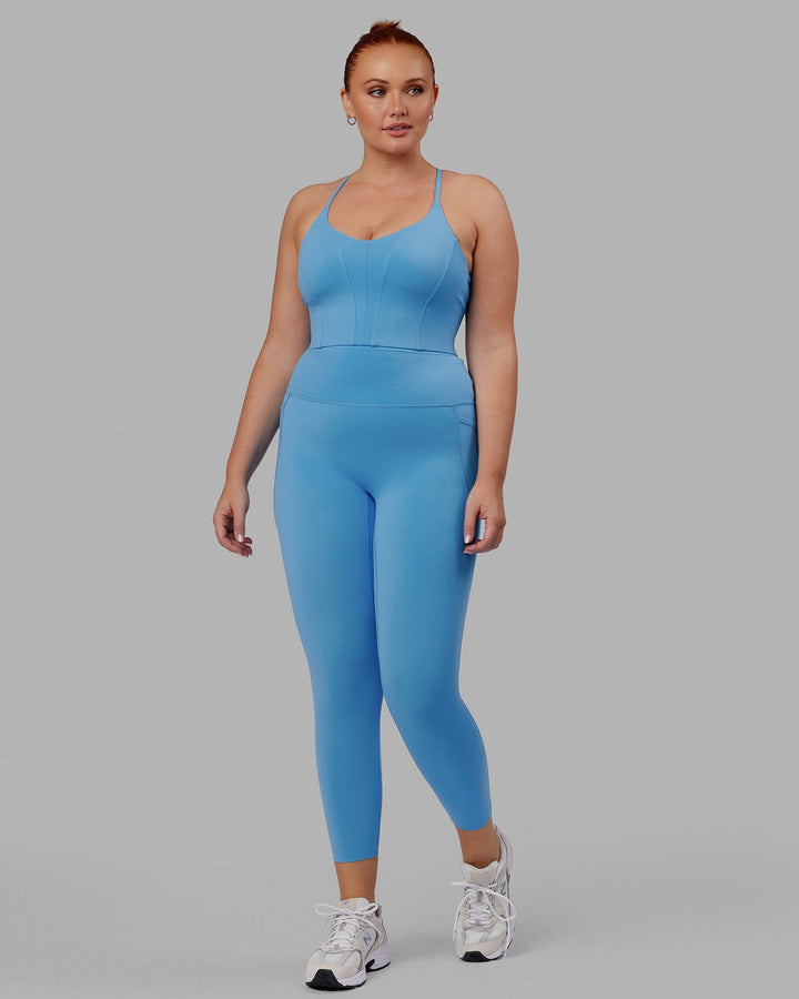 Woman wearing Elixir 7/8 Tights With Pockets - Azure Blue