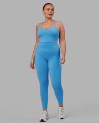 Woman wearing Elixir Ultra High-Rise Full Length Legging Pockets - Azure Blue