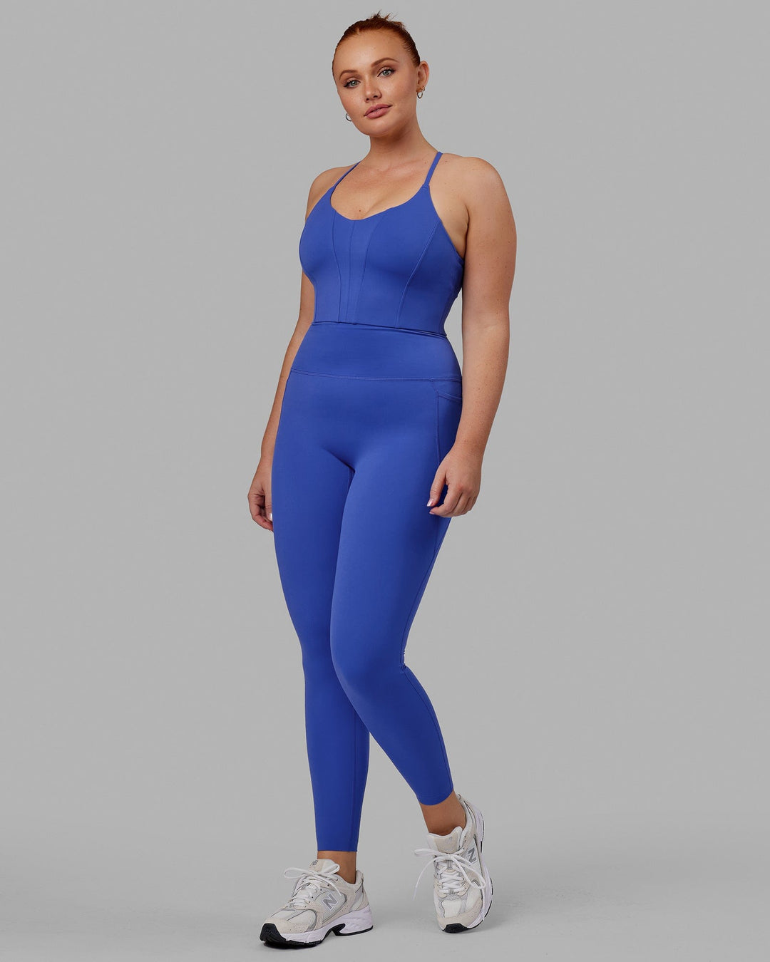 Woman wearing Elixir Ultra High-Rise Full Length Legging Pockets - Power Cobalt