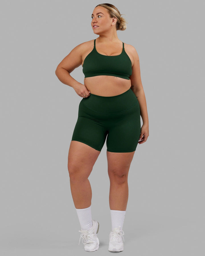 Woman wearing Elixir Mid Short Tight - Ivy Green