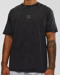 Man wearing Everyday Elevation FLXCotton Oversized Tee - Black Washed-Carbon Green | Model:Xav | Size:L