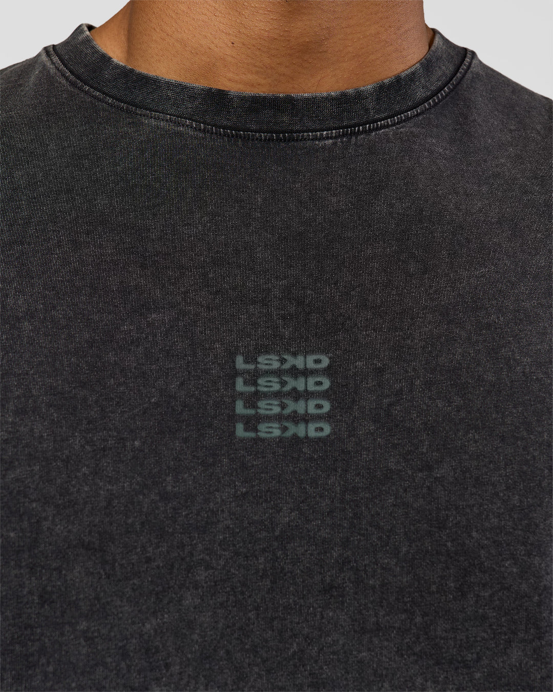 Man wearing Everyday Elevation FLXCotton Oversized Tee - Black Washed-Carbon Green | Model:Xav | Size:L
