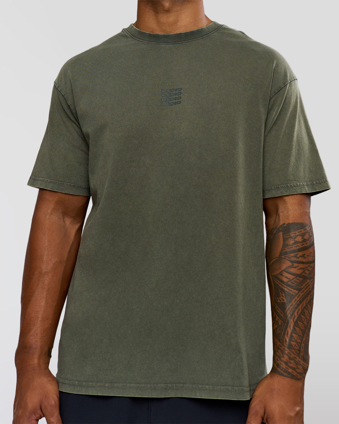 Man wearing Everyday Elevation FLXCotton Oversized Tee - Carbon Green Washed -White | Model:Xav | Size:L