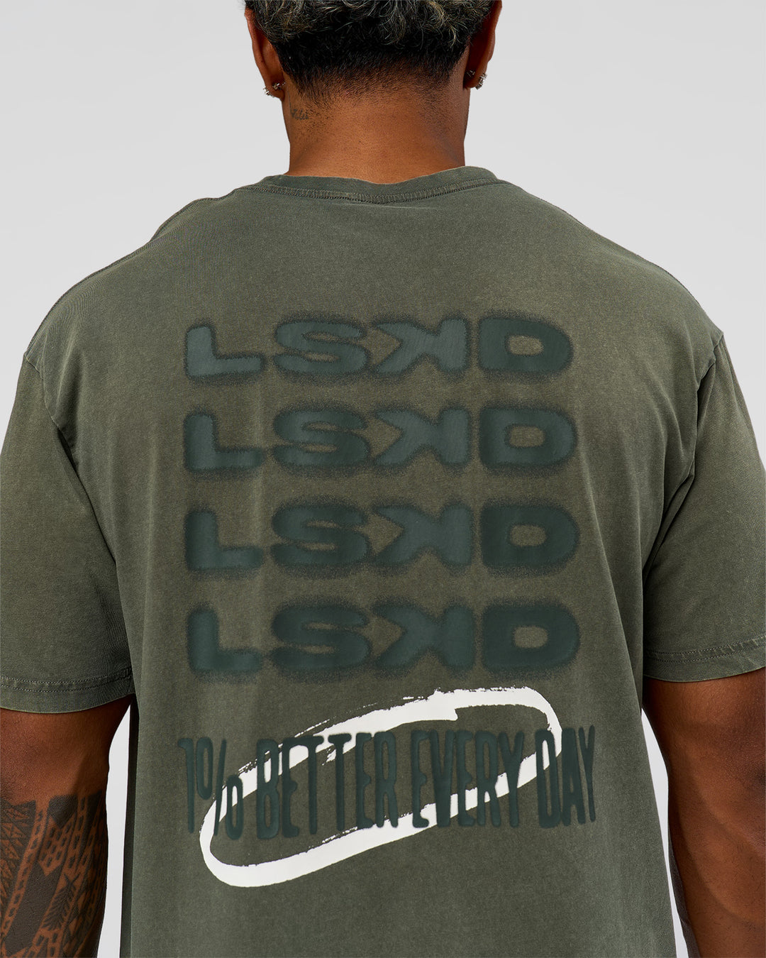 Man wearing Everyday Elevation FLXCotton Oversized Tee - Carbon Green Washed -White | Model:Xav | Size:L
