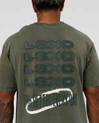 Man wearing Everyday Elevation FLXCotton Oversized Tee - Carbon Green Washed -White | Model:Xav | Size:L