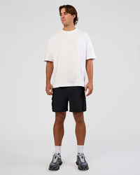 Man wearing Functional Cargo 6" Short - Black | Model:Marcus | Size:L