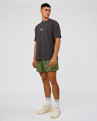 Man wearing Functional Training 5" Short - Friction Print Hyper Green | Model:Jackson | Size:L
