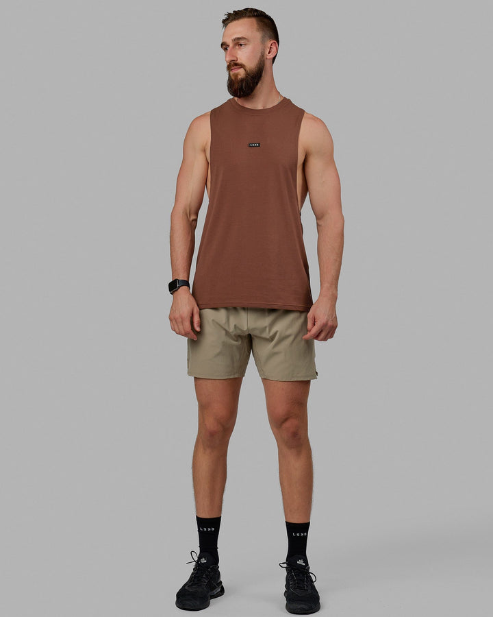 Man wearing Fundamental FLXCotton Drop Arm Tank - Cappuccino