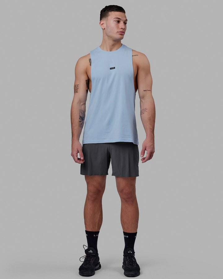 Man wearing Fundamental FLXCotton Drop Arm Tank - Windsurfer