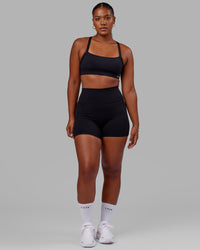 Woman wearing O.G. Fusion Ultra High-Rise 4" Short Pockets - Black | Model:Sierra | Size:L