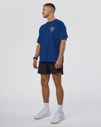 Man wearing GTC Heavyweight Oversized Tee - Washed Midnight Blue-Marsh | Model:Nikola | Size:L