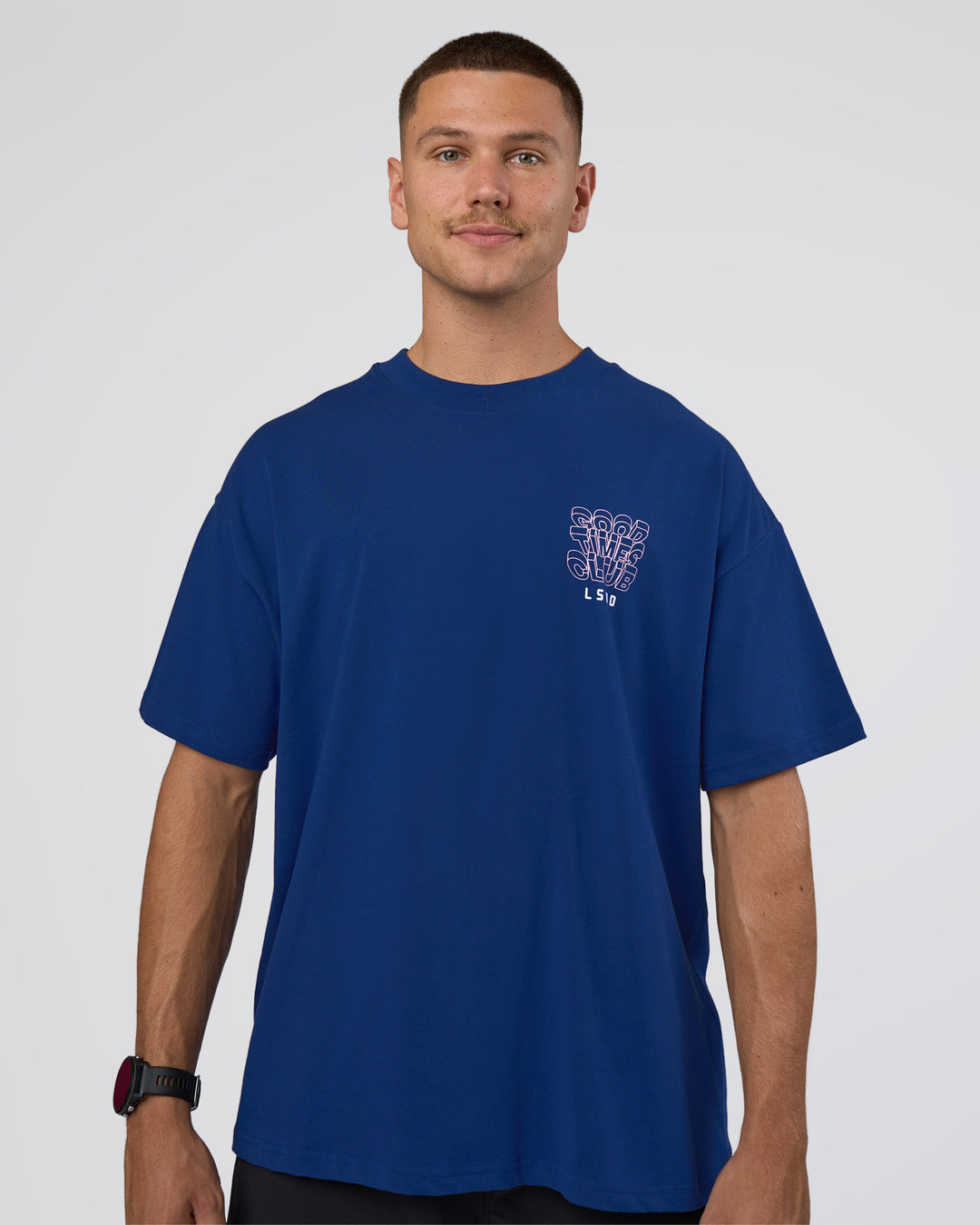 Man wearing GTC Heavyweight Oversized Tee - Washed Midnight Blue-Marsh | Model:Nikola | Size:L