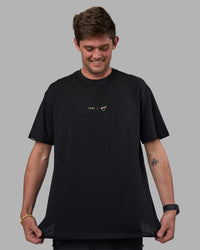 Man wearing Good Human Factory Vol 2 FLXCotton Oversize Tee - Black | Model:Cooper | Size:L