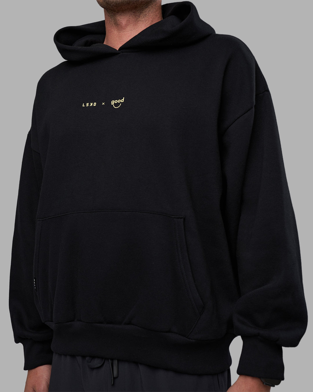 Man wearing Good Human Factory Vol 2 Hoodie - Black | Model:Cooper | Size:L