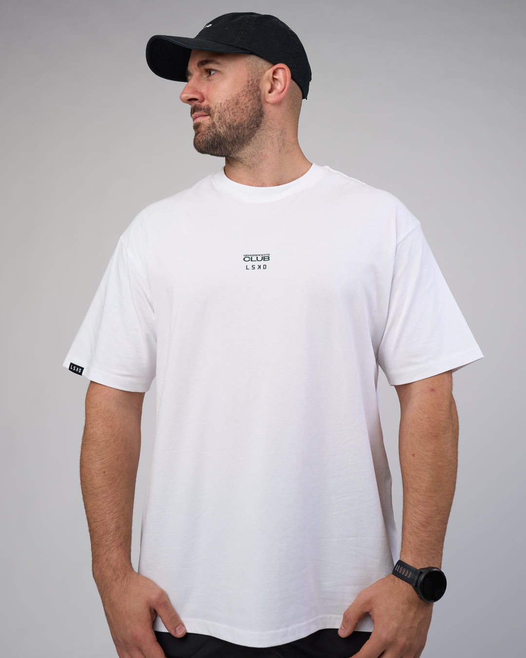 Man wearing Grass Roots CFC FLXCotton Oversize Tee - White | Model:Dean | Size:L