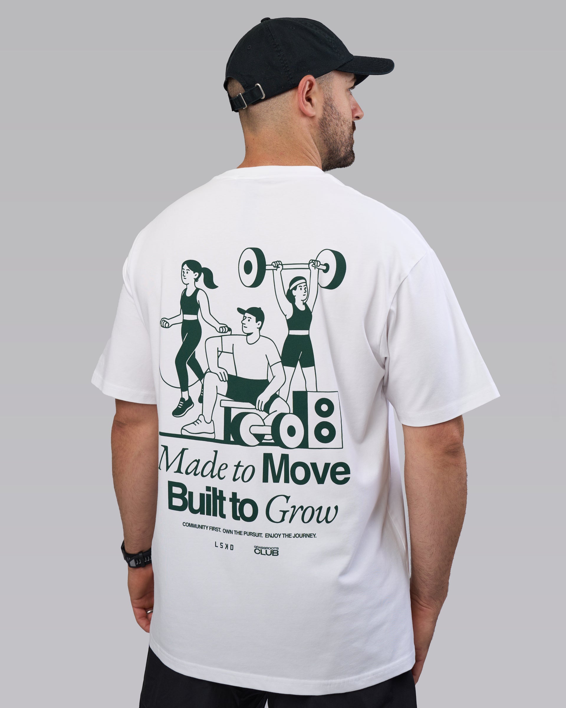 Man wearing Grass Roots CFC FLXCotton Oversize Tee - White | Model:Dean | Size:L