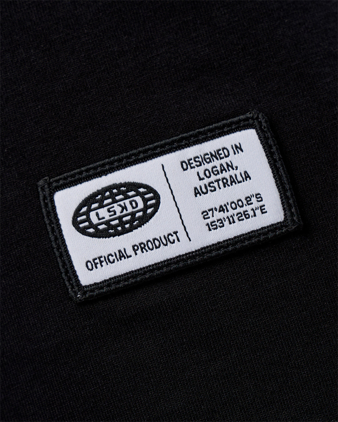 Man wearing Grid FLXCotton Oversized Tee - Black-White | Model:Zoran | Size:L