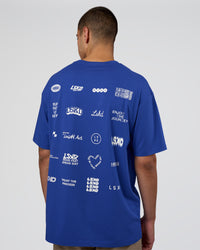 Man wearing Grid FLXCotton Oversized Tee - Power Cobalt-White | Model:Zoran | Size:L