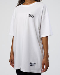 Woman wearing Grid FLXCotton Oversized Tee - White-Black | Model:Jordan | Size:L