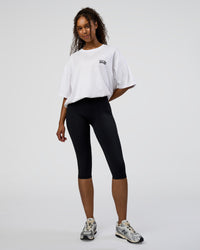 Woman wearing Grid FLXCotton Oversized Tee - White-Black | Model:Jordan | Size:L