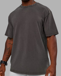 Man wearing Heart FLXCotton Oversized Tee - Washed Dark Storm-Violet Ray | Model:Sam | Size:L