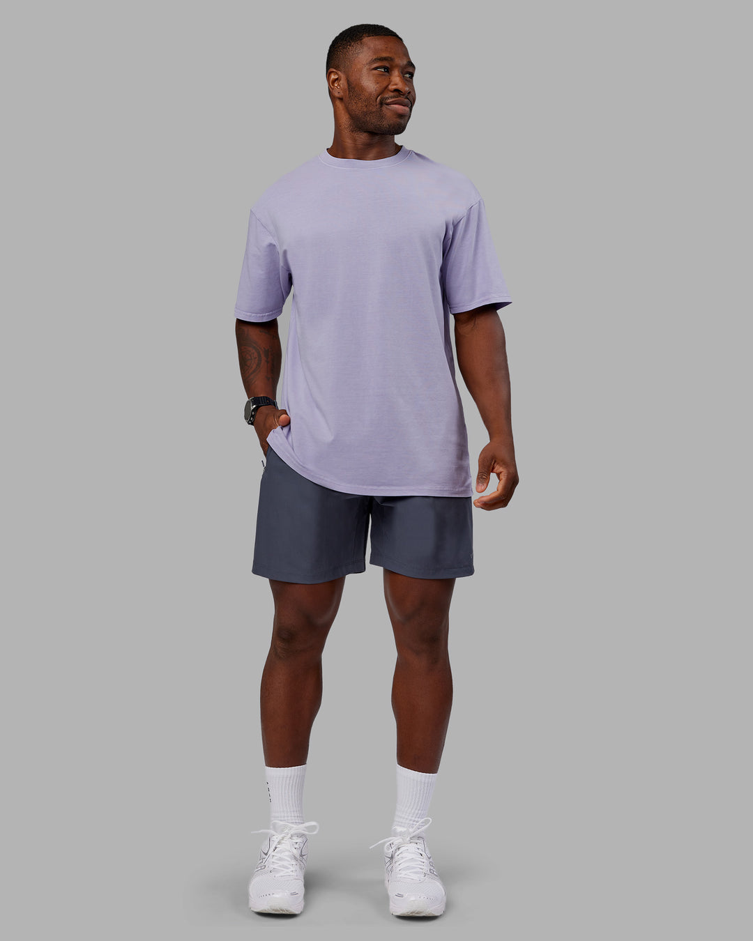 Man wearing Heart FLXCotton Oversized Tee - Washed Violet Ray-White | Model:Sam | Size:L