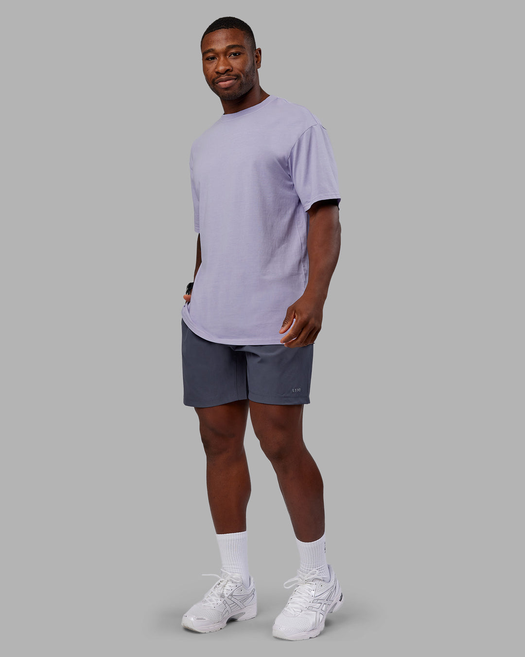 Man wearing Heart FLXCotton Oversized Tee - Washed Violet Ray-White | Model:Sam | Size:L
