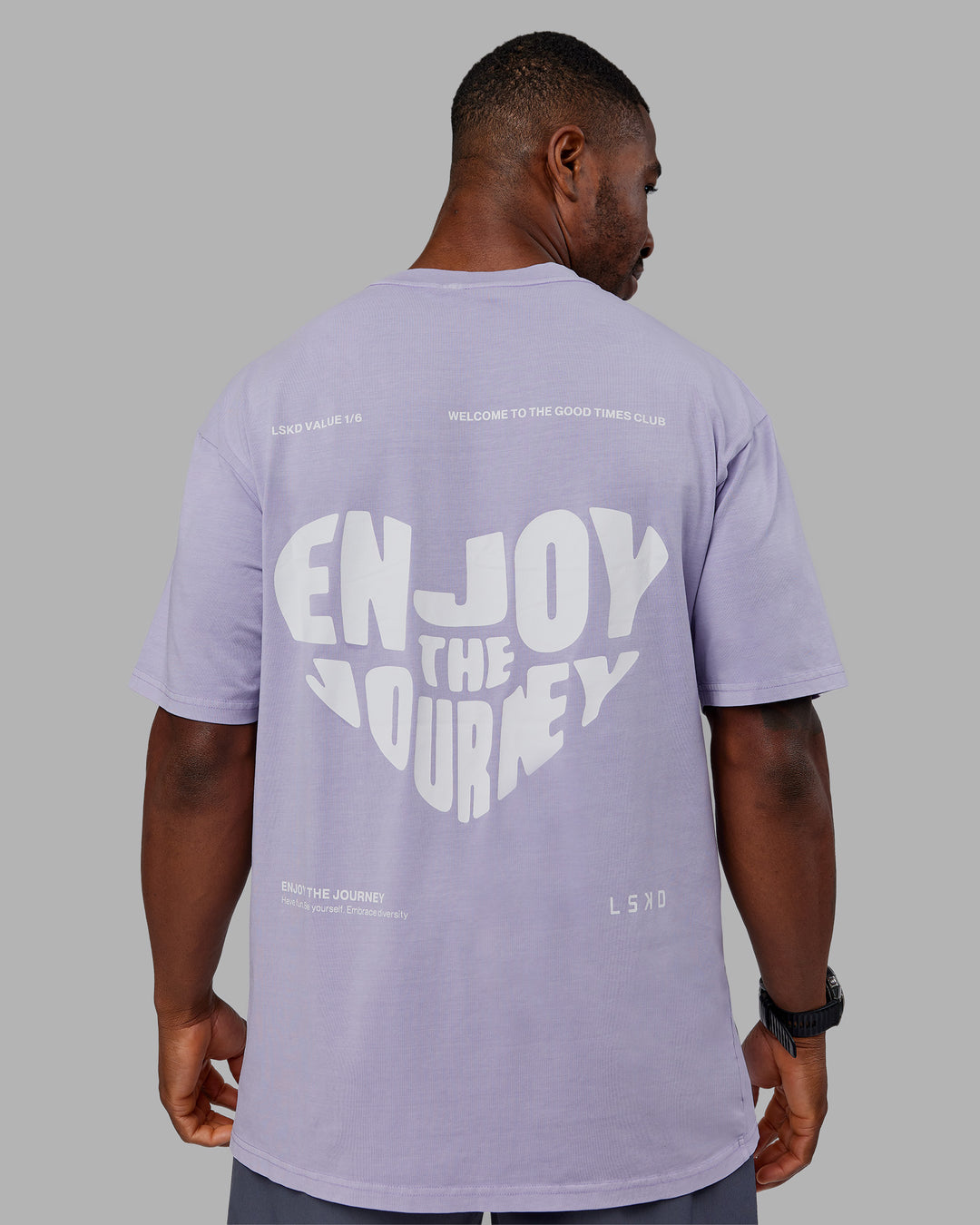 Man wearing Heart FLXCotton Oversized Tee - Washed Violet Ray-White | Model:Sam | Size:L