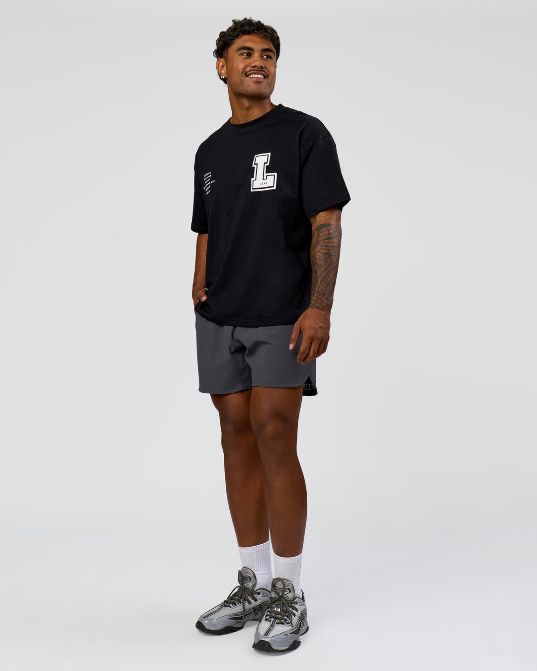 Man wearing Hype Heavyweight Unisex Oversized Tee - Black-White | Model:Xavier | Size:L - view 6