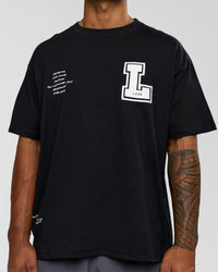 Man wearing Hype Heavyweight Unisex Oversized Tee - Black-White | Model:Xavier | Size:L | Thumbnail Index: 7