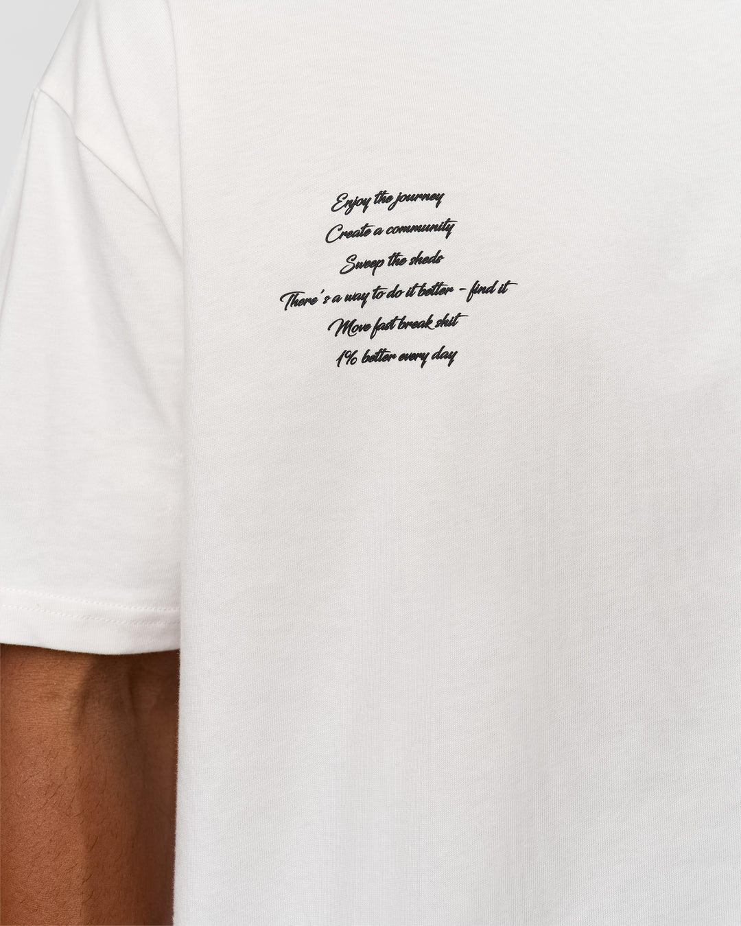 Man wearing Hype Heavyweight Unisex Oversized Tee - Off White-Black | Model:Xavier | Size:L