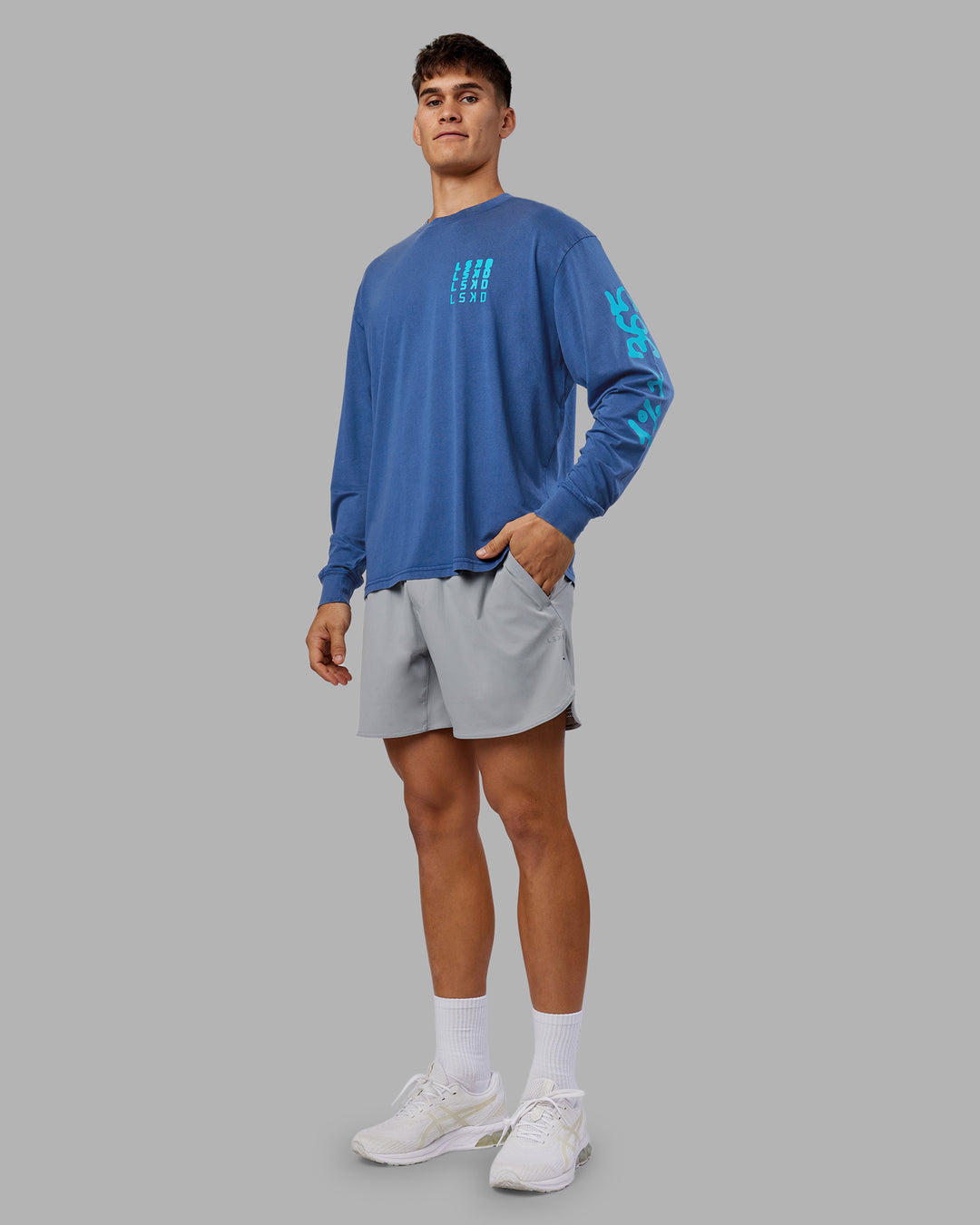 Man wearing Inferno Journey FLXCotton Oversized Long Sleeve Tee - Midnight Blue-Blue Bird | Model:Jackson | Size:L