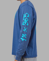 Man wearing Inferno Journey FLXCotton Oversized Long Sleeve Tee - Midnight Blue-Blue Bird | Model:Jackson | Size:L