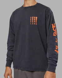 Man wearing Inferno Journey FLXCotton Oversized Long Sleeve Tee - Washed Black-Ultra Orange | Model:Jackson | Size:L