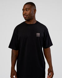 Man wearing Inferno Journey FLXCotton Oversized Tee - Black-Ultra Fuchsia | Model:Sam | Size:L