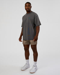 Man wearing Inferno Journey FLXCotton Oversized Tee - Dark Storm Washed-Iceberg Green | Model:Sam | Size:L