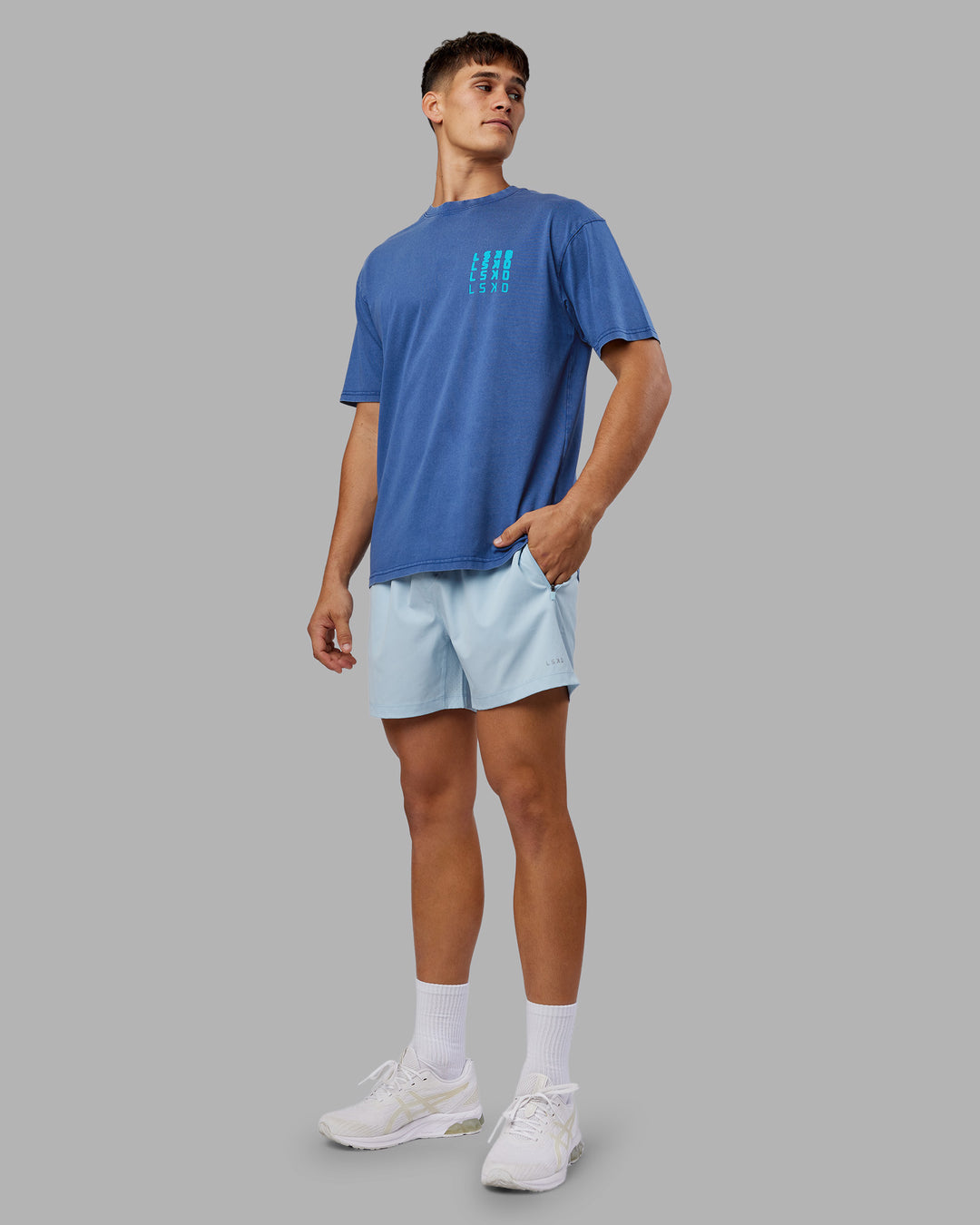 Man wearing Inferno Journey FLXCotton Oversized Tee - Midnight Blue Washed-Blue | Model:Jackson | Size:L