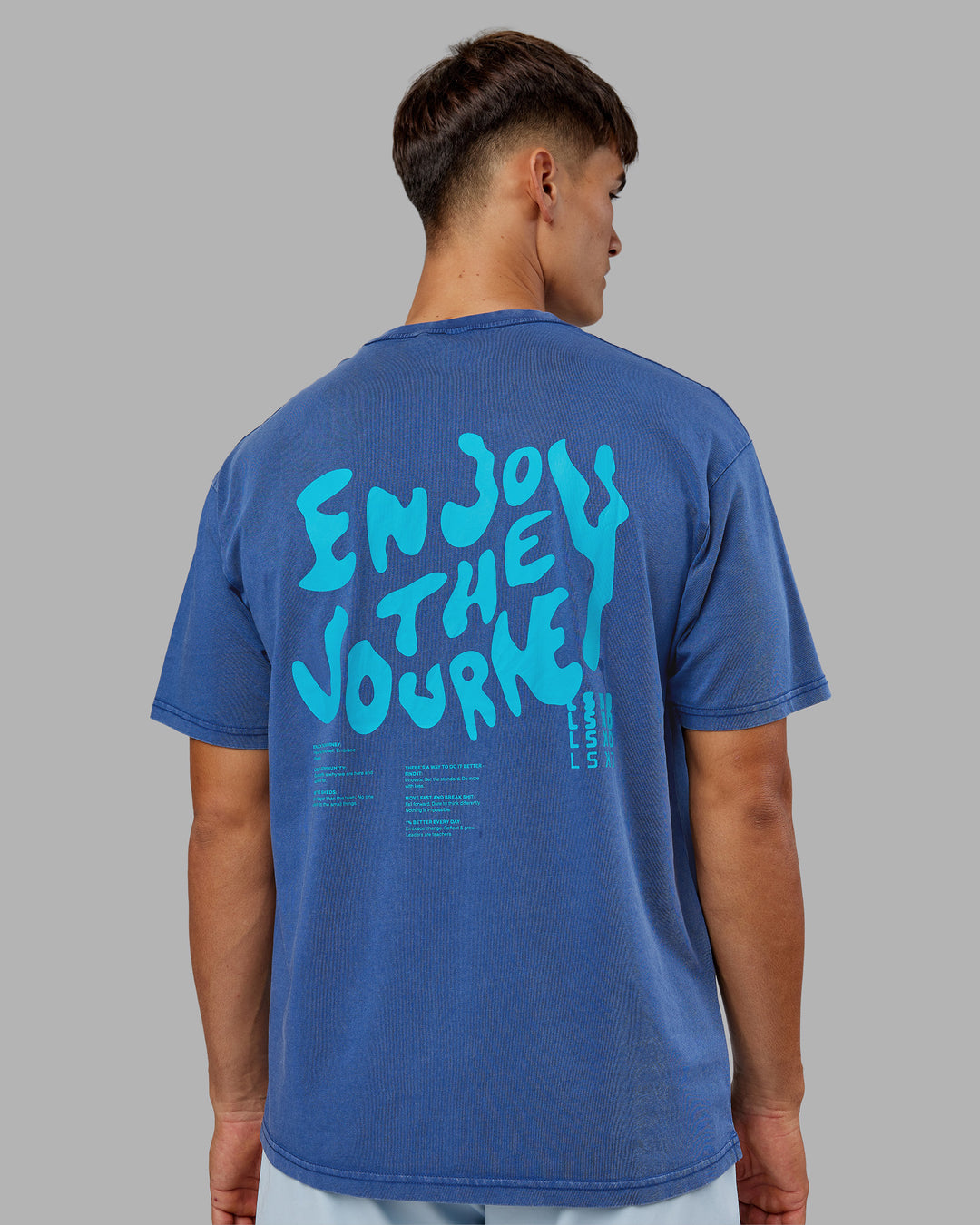 Man wearing Inferno Journey FLXCotton Oversized Tee - Midnight Blue Washed-Blue | Model:Jackson | Size:L
